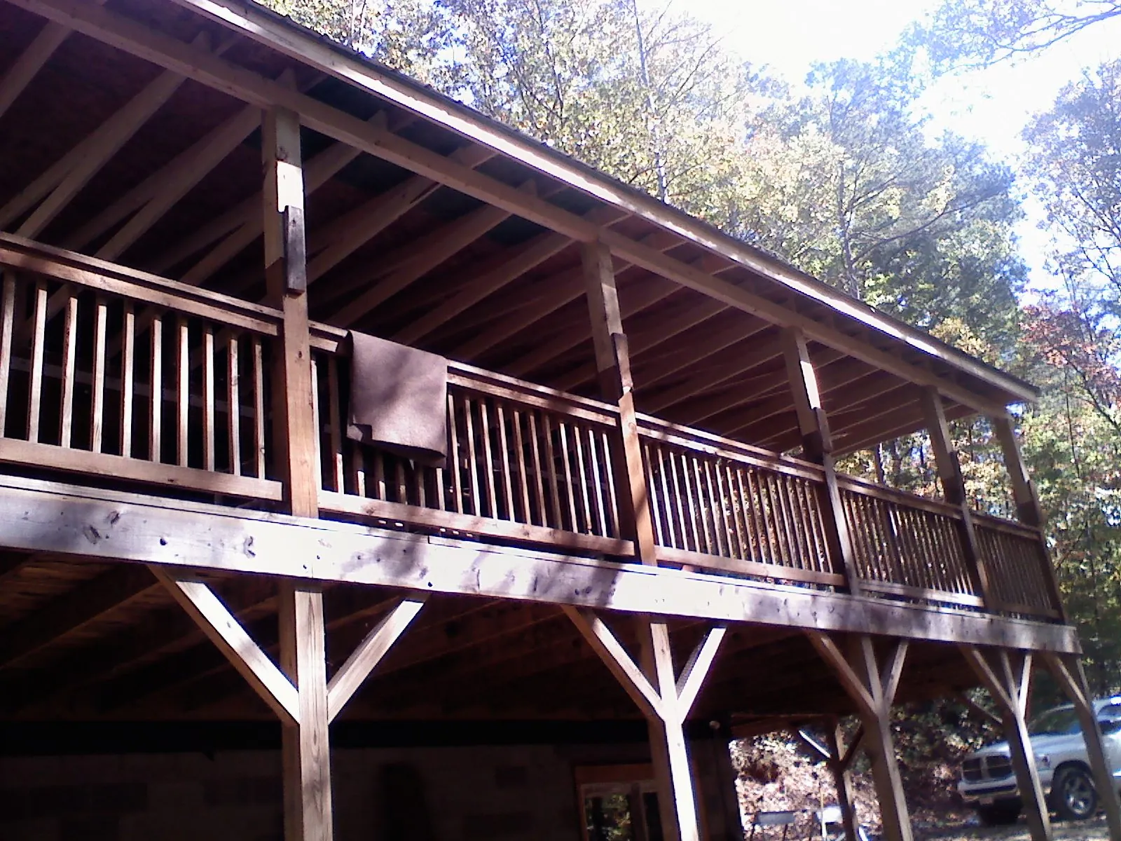 Timber framing under a new elevated porch and deck — Roof Leak Repair in Hollidaysburg by Roofing Brothers